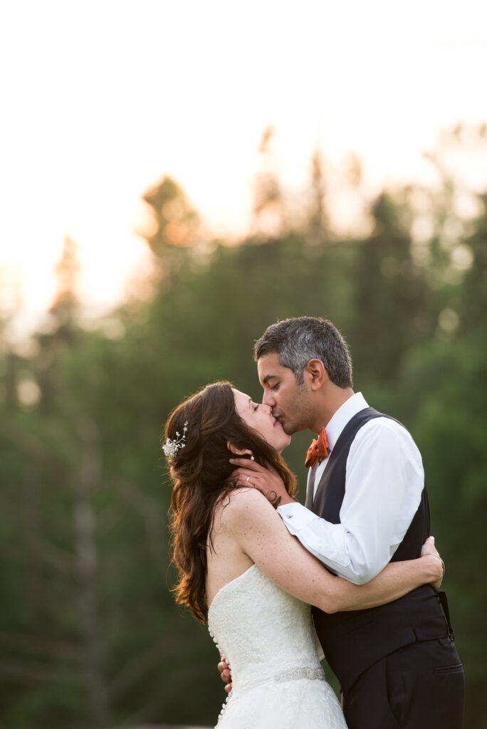 vermont wedding sunset after a thunderstorm couple kissing outside