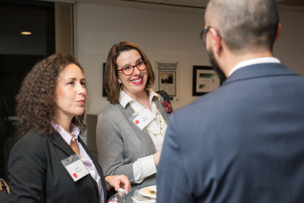 candid laughter at non-profit reception