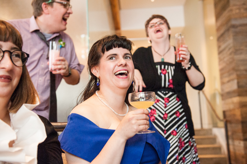 crowd reacts to a great wedding toast