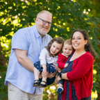 Family posing outside