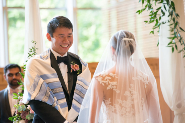 jewish wedding groom smiling